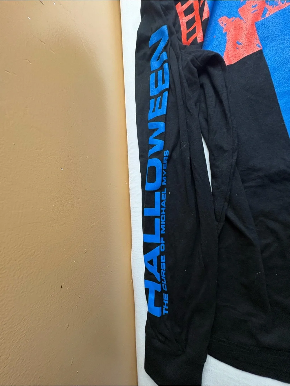 Hot Topic Black Crewneck Sweater with Blue and Red Halloween Graphics